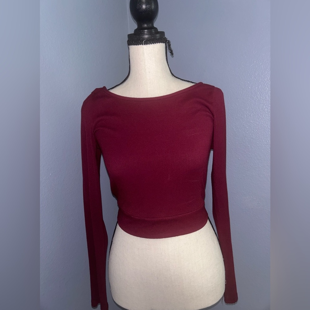 size medium boutique top crisscrossed in the back!